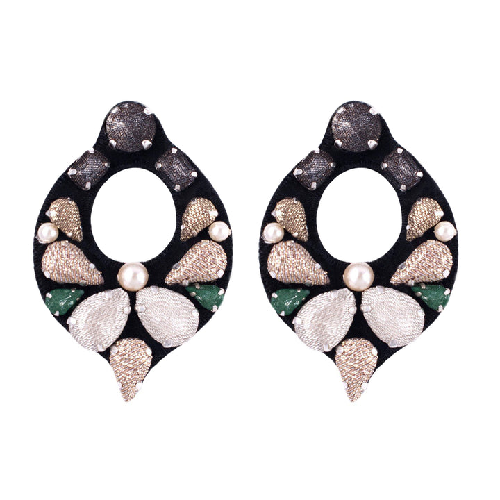 Drop earrings neutral colours with pop of green.
