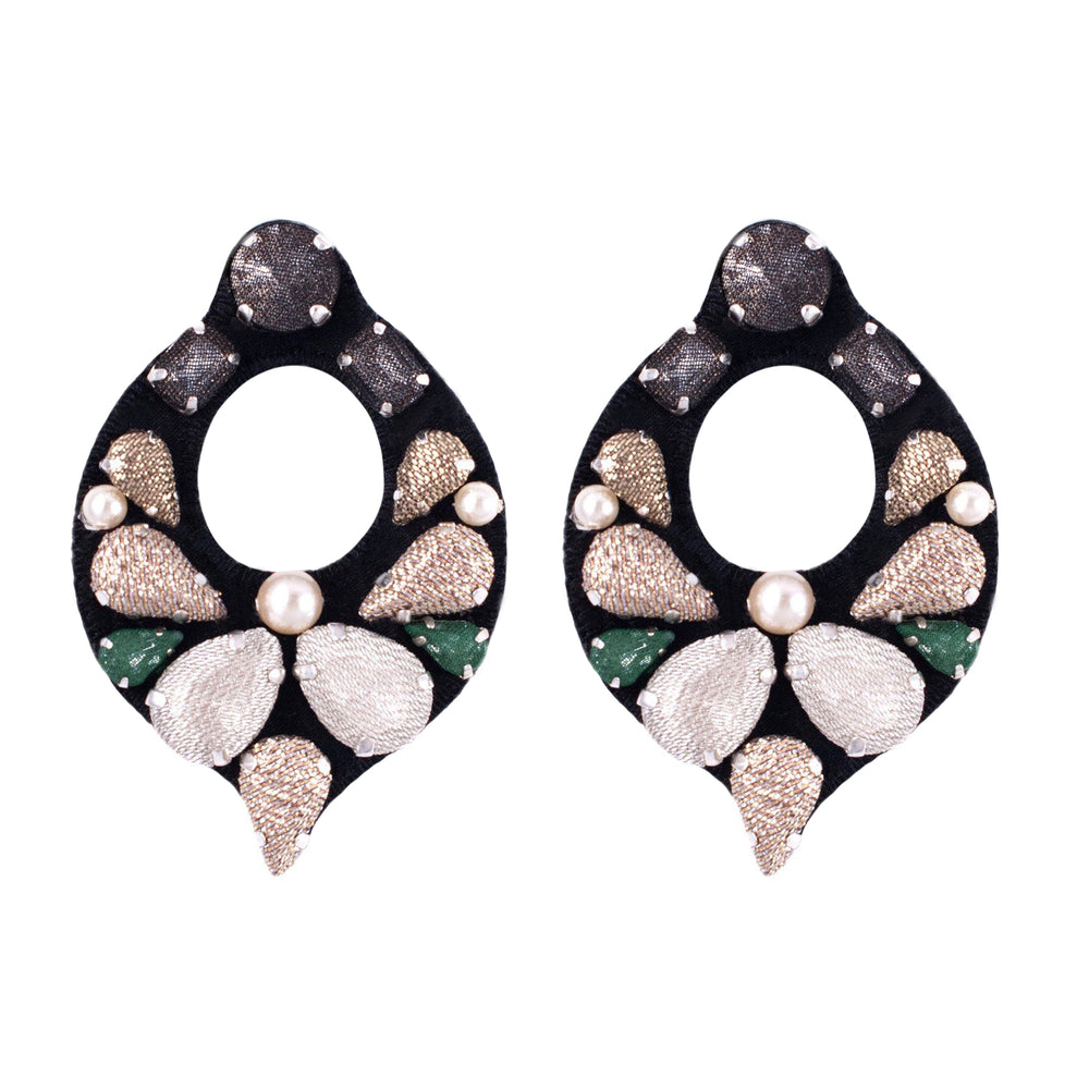 Drop earrings neutral colours with pop of green.