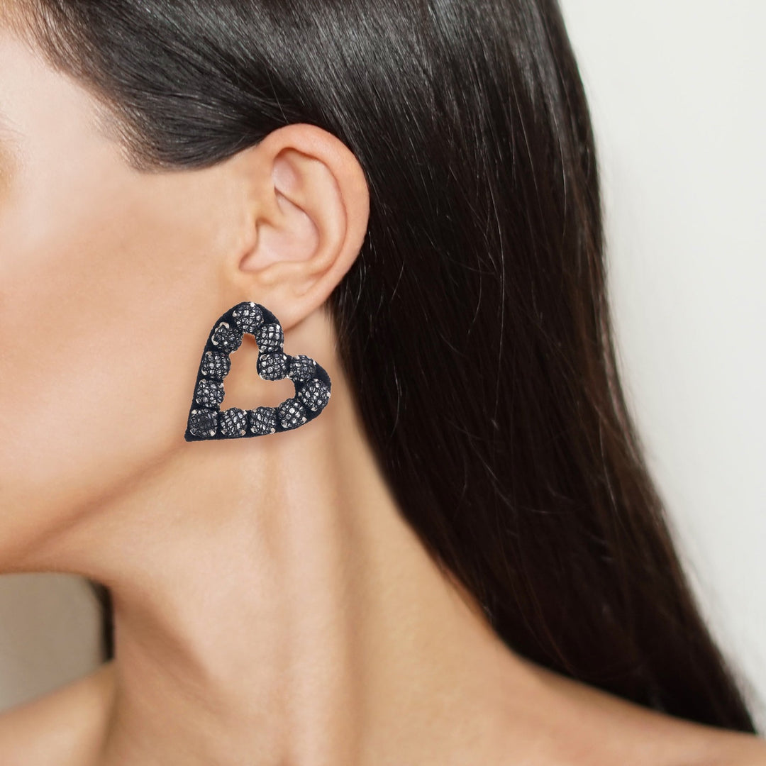Hearts earrings lace net on model.