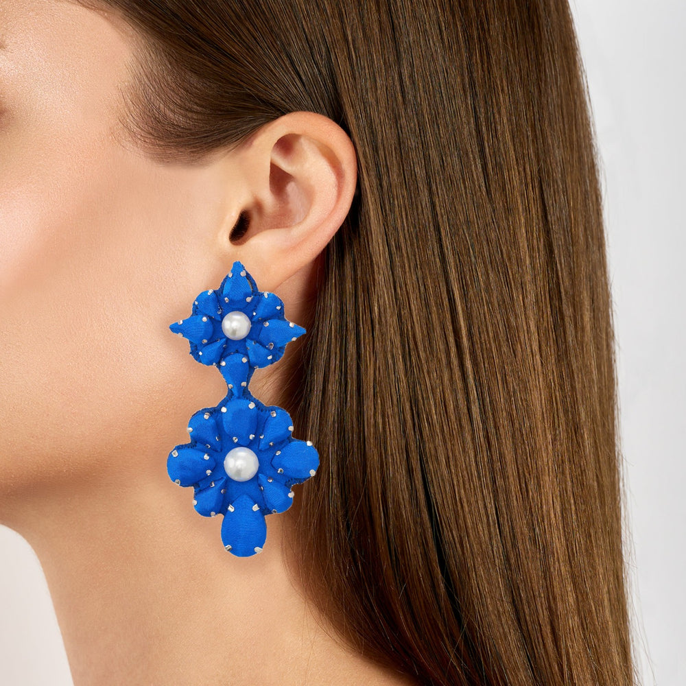 Mandala silk earrings on model.