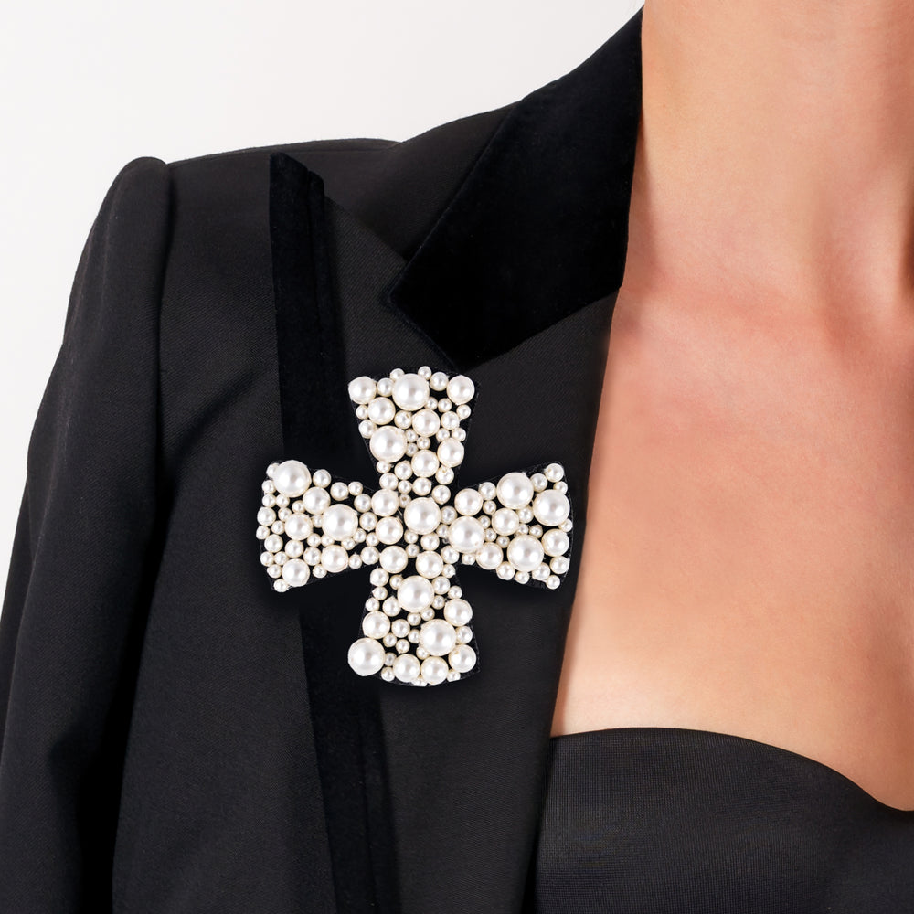 Cross brooch/pendant covered in pearls.