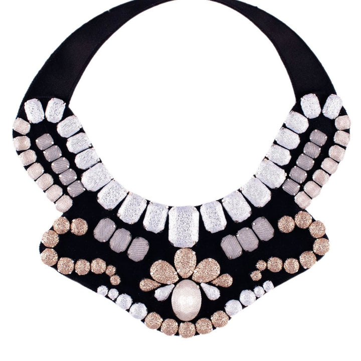 Statement gold and silver necklace.