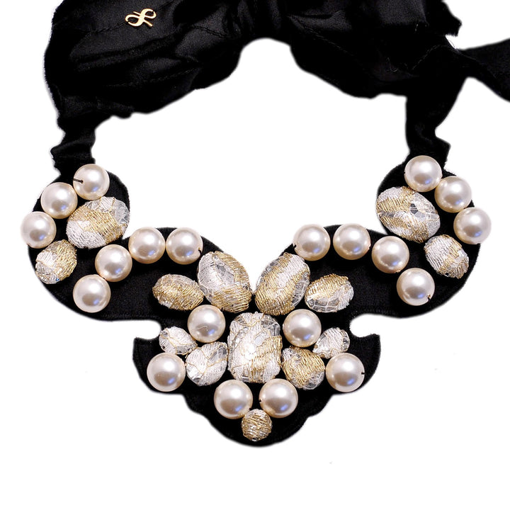 Statement gold lace necklace with pearls.