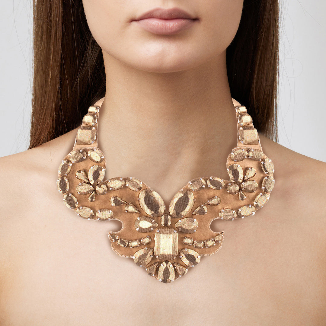 Statement lurex necklace on model.